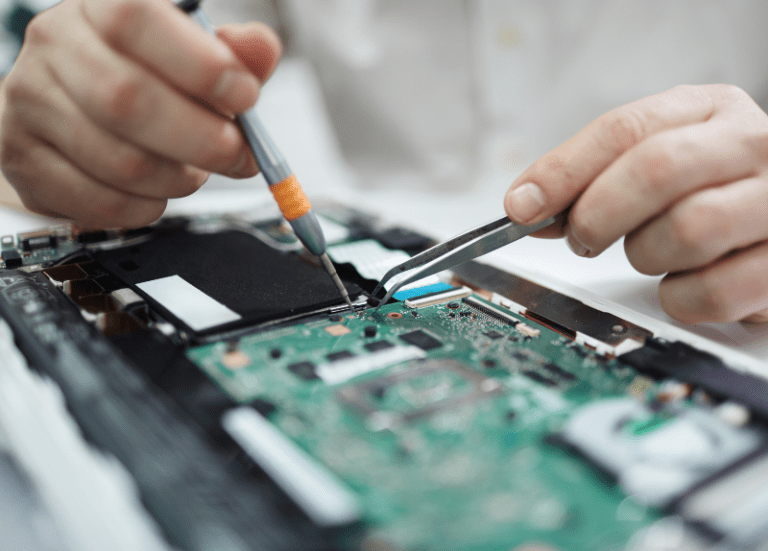 Man working on circuit board
