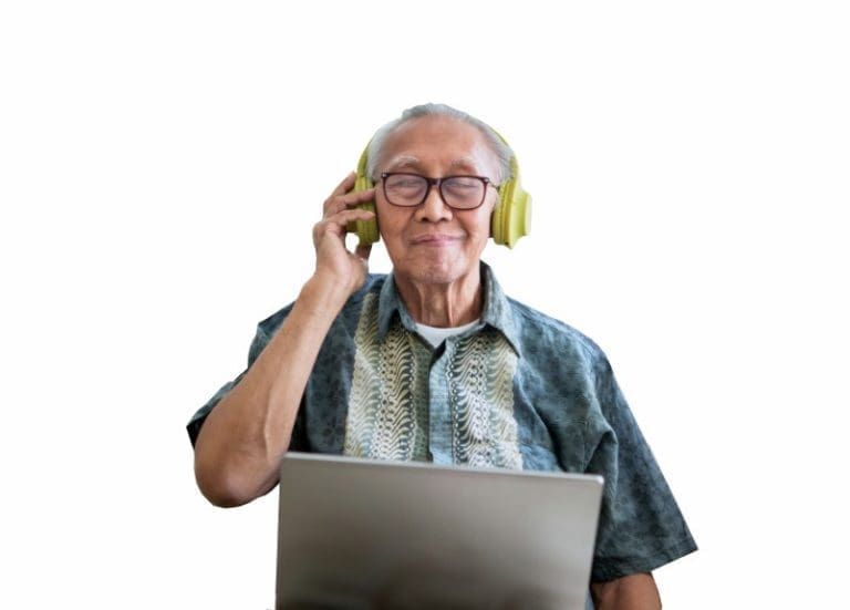 Senior Man with Headphones Listening to Music