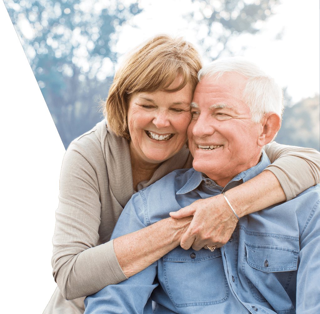 Senior Couple Hugging Outside