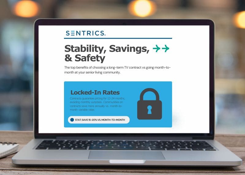Laptop showing a Sentrics webpage highlighting benefits of long-term TV contracts in senior living communities.