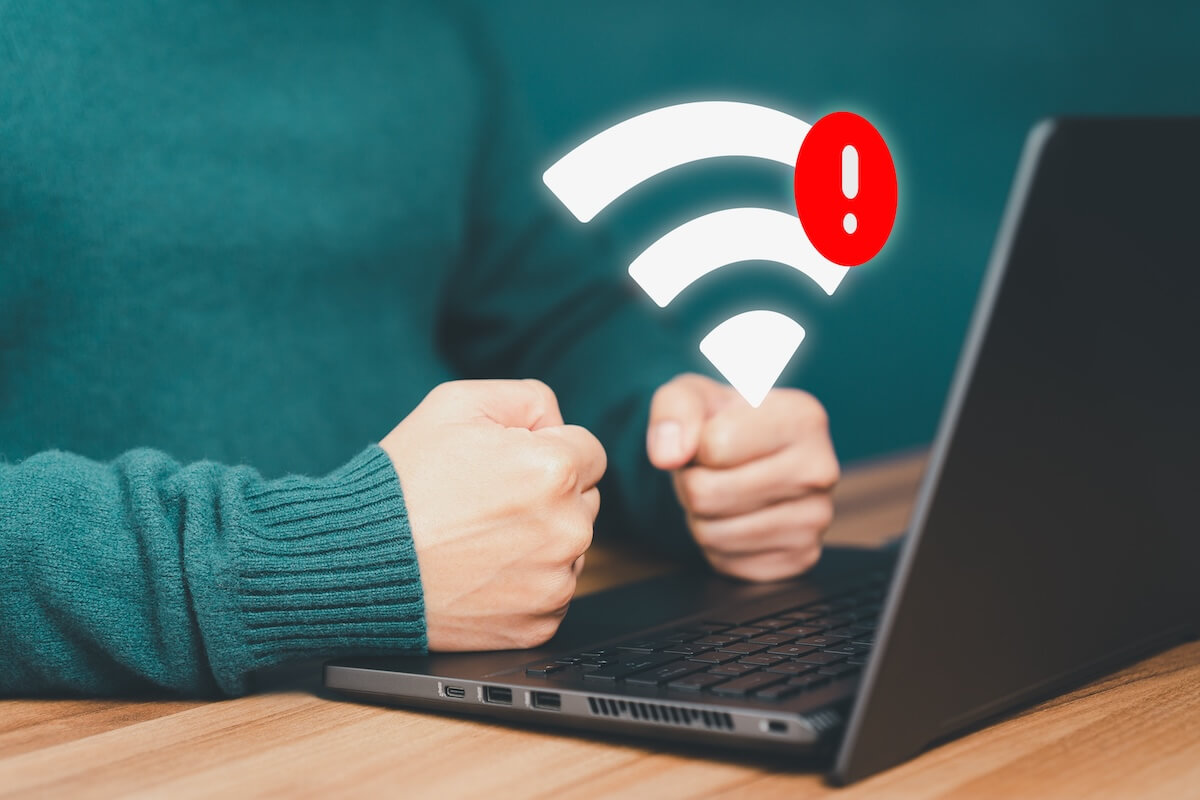 Man using a computer laptop to connect to wifi but wifi not connected, and waiting to loading digital business data form website, concept technology of waiting for connect to wifi.